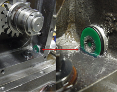 Getriebe mit eingebautem mit Verschleißsensor OPCom FerroS und angelagerten Partikeln